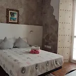 En بيت ضيافة